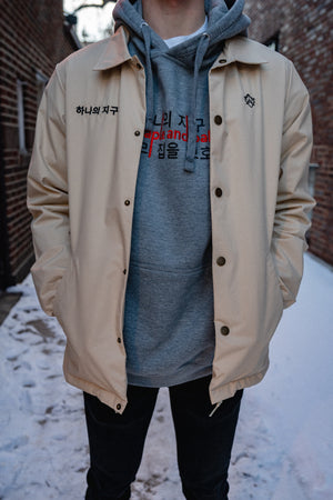 "one earth" coaches jacket